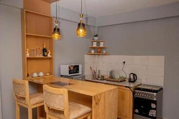 تختخواب و صبحانه Riverpoint Inn, Arusha