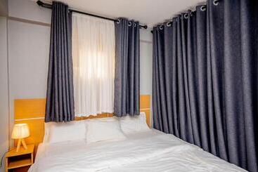 تختخواب و صبحانه Riverpoint Inn, Arusha
