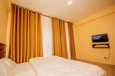تختخواب و صبحانه Riverpoint Inn, Arusha