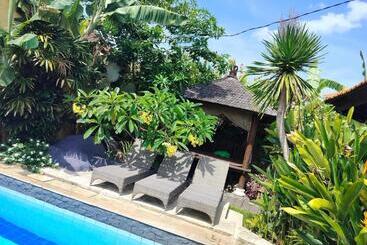 تختخواب و صبحانه Villa Layang Bulan