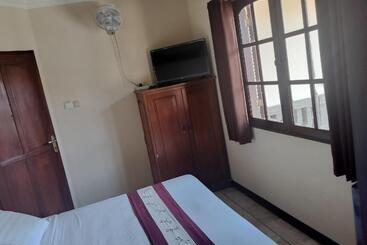 تختخواب و صبحانه Villa Layang Bulan