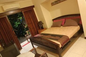 تختخواب و صبحانه Villa Layang Bulan