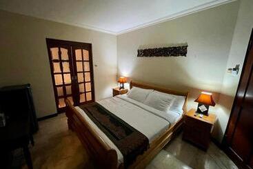 تختخواب و صبحانه Villa Layang Bulan