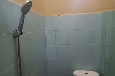 هتل Oyo 93332 Kharis Home Stay