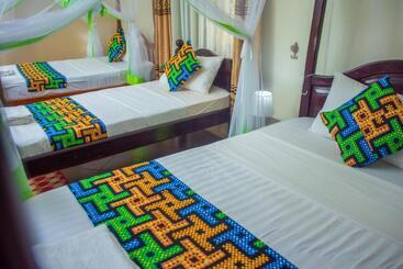پانسیون Berengei Silverback Guesthouse And Homestay