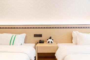 هتل Xishu Garden Inn Travel Agency Service Car Rent Service English Speaking