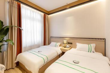 هتل Xishu Garden Inn   Travel Agency Service   Car Rent Service   English Speaking