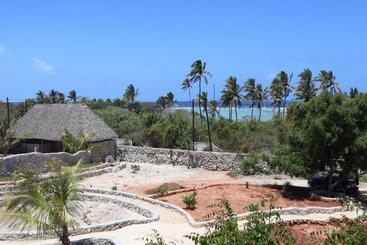 هتل Holiday Time Bungalows Zanzibar