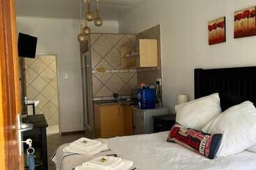 پانسیون 9 Wena Ave Guesthouse