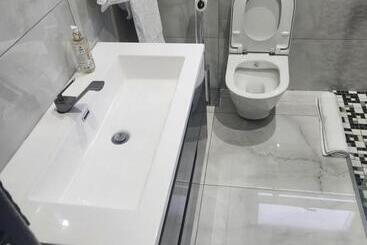 تختخواب و صبحانه The Residence Villa