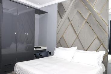 تختخواب و صبحانه The Residence Villa