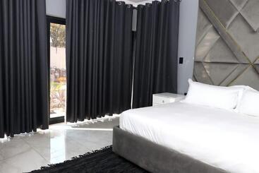 تختخواب و صبحانه The Residence Villa