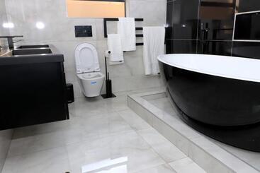 تختخواب و صبحانه The Residence Villa
