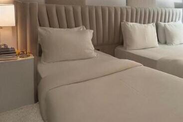 The Queen Airport Hotel Round Trip Airport Service