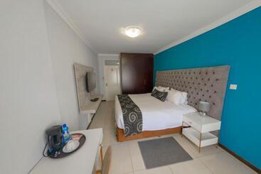 تختخواب و صبحانه Green Lagoon Guest House Tawana