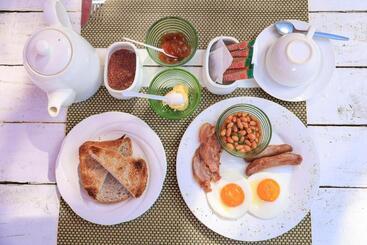 تختخواب و صبحانه Green Lagoon Guest House Tawana