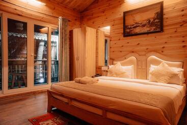 تختخواب و صبحانه Obrigado Cottages
