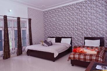 בית מלון כפרי Vasundhara Palace