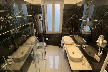 تختخواب و صبحانه Palazzo Chinial