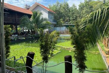 تختخواب و صبحانه Bưng Riềng Garden
