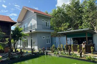 تختخواب و صبحانه Bưng Riềng Garden