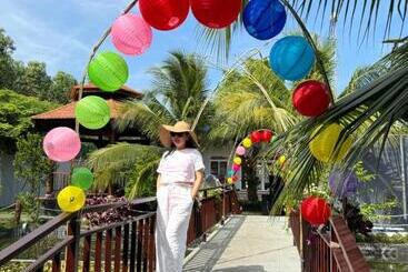 تختخواب و صبحانه Bưng Riềng Garden
