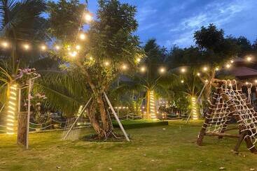تختخواب و صبحانه Bưng Riềng Garden
