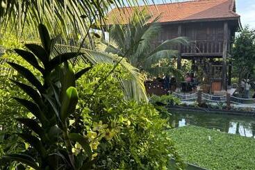 تختخواب و صبحانه Bưng Riềng Garden