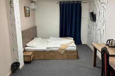 هتل Ilhombek Guest House