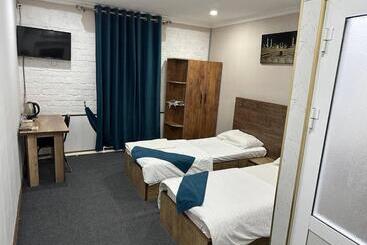 هتل Ilhombek Guest House