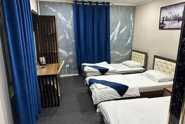 هتل Ilhombek Guest House