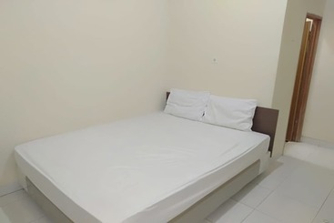 هتل Spot On 93464 Penginapan Tulimario Syariah
