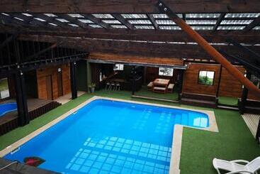 پانسیون Hostal Y Cabañas Puerto Pucon
