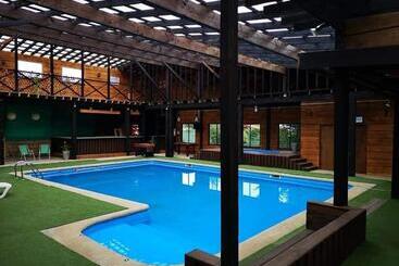پانسیون Hostal Y Cabañas Puerto Pucon