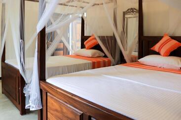 تختخواب و صبحانه Welcome Inn Mirissa