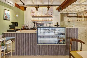 هتل Townhouse Oak Passport Inn