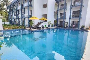 בית מלון כפרי Grand Opulence Morjim Bliss Beach Resort