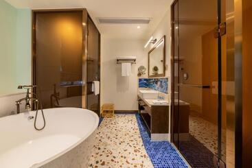 هتل Overseas Chinese Town Nanyang Inn