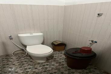 هتل Spot On 93621 Kost Bu Tutik Syariah