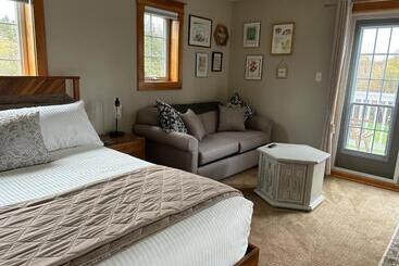 پانسیون Tides Inn Guest Suites