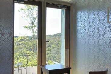 هتل Auberge Frenchnomori