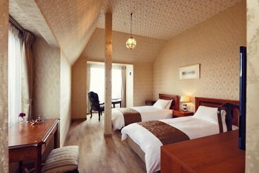 هتل Auberge Frenchnomori
