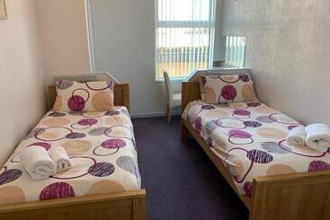 پانسیون Austins Self Service Guest House
