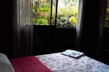 تختخواب و صبحانه Cabinas Nirvana Ecolodge