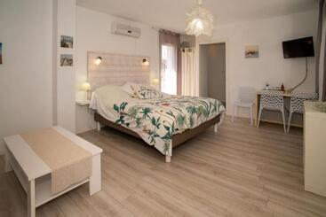 تختخواب و صبحانه Maison Lucilda