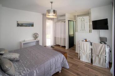 تختخواب و صبحانه Maison Lucilda