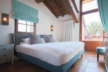 تختخواب و صبحانه La Maison Tamarin