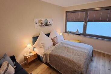 ホテル Ferienwohnungen Cafe Maarblick