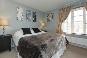 تختخواب و صبحانه The Porterhouse