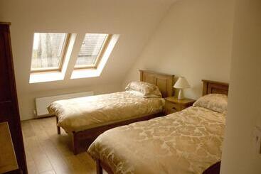 تختخواب و صبحانه Courtyard Mews Armagh City